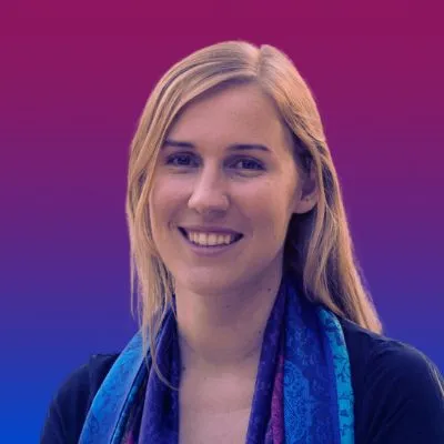 Portrait of a smiling blonde woman with colorful scarf against a purple-blue gradient background.